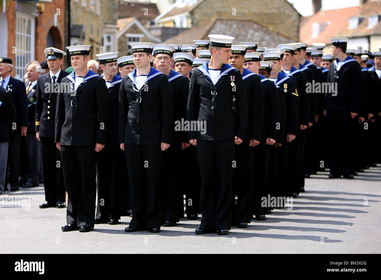 UK Armed Forces Day Parade Royal Navy Sailors from HMS Heron Marching through Sherborne Dorset Stock Photo