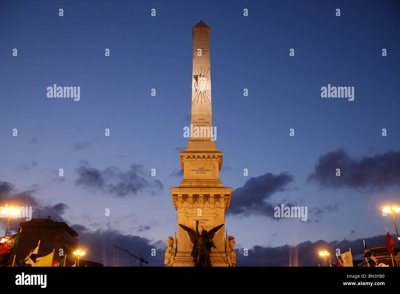 Obelisk on the square Praca dos Restauradores in Lisbon at night ...