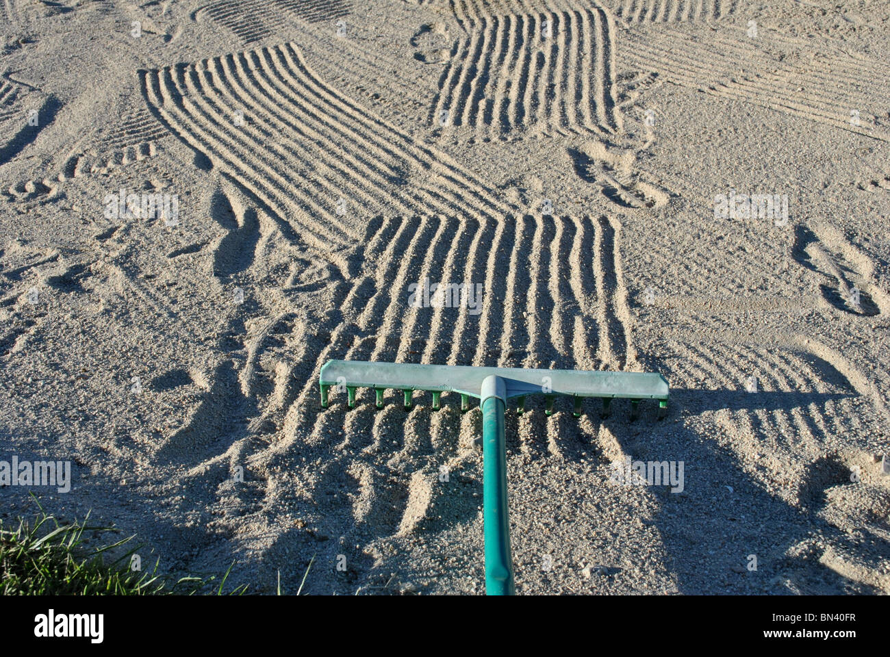 rake marks in a bunker Stock Photo Alamy