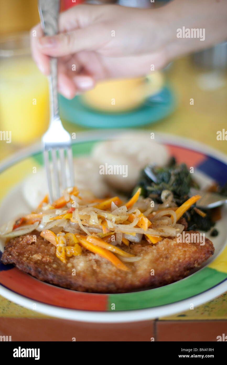 Jamaican breakfast dish ackee and saltfish with boiled yam and