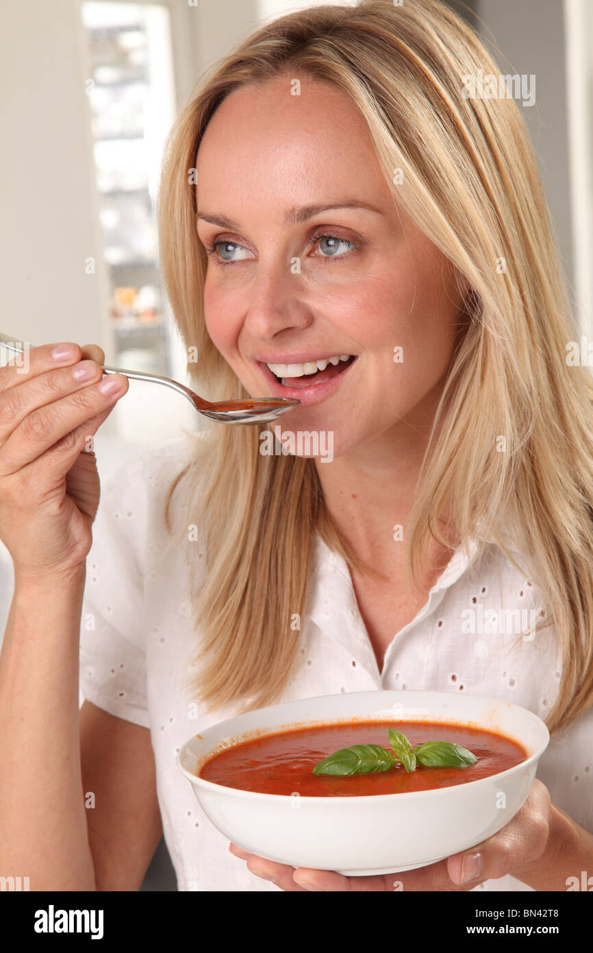 WOMAN EATING SOUPWOMAN EATING SOUP Stock Photo Alamy