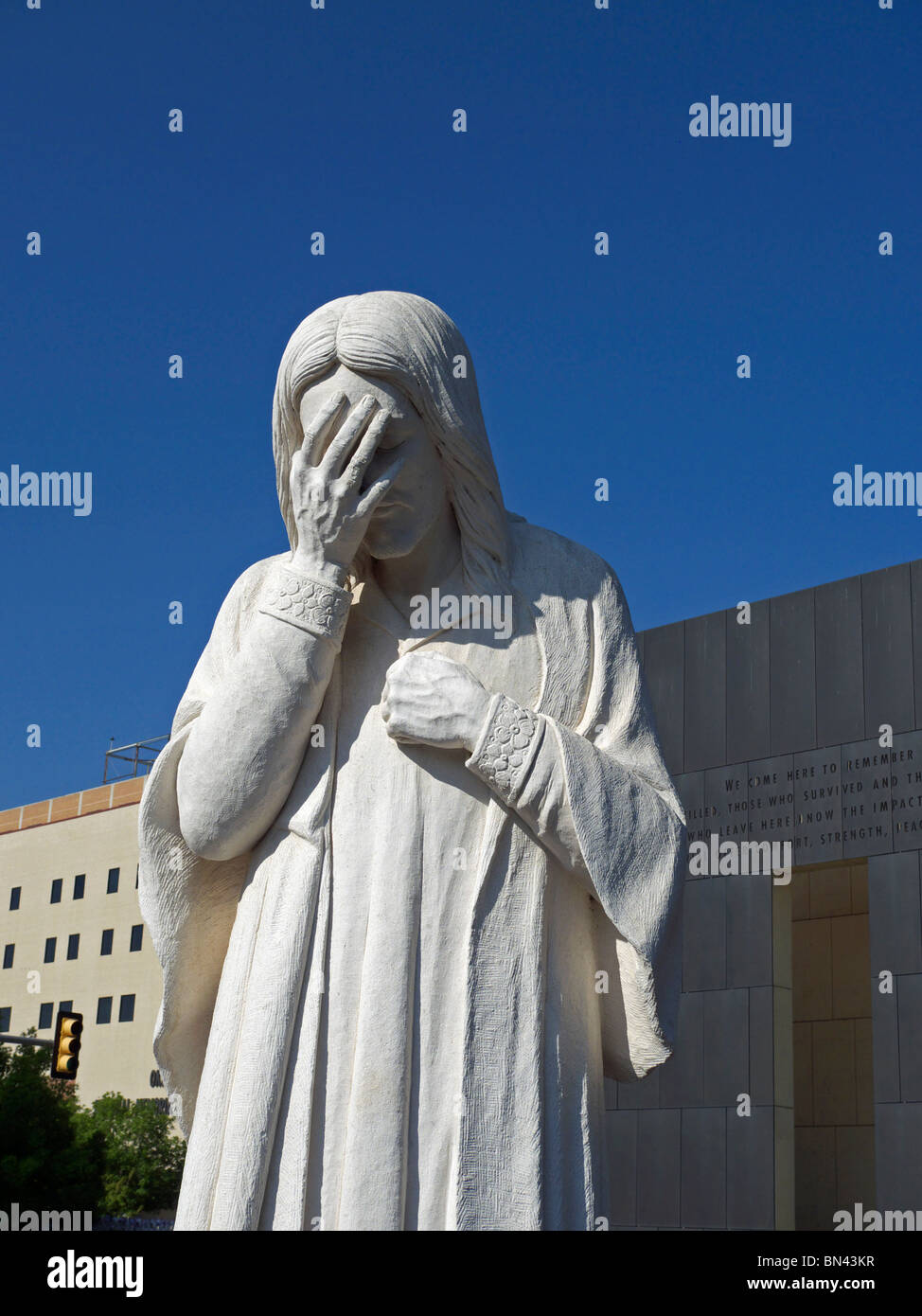 The sculpture entitled 'And Jesus Wept' adjacent to the Oklahoma City National Memorial. Stock Photo