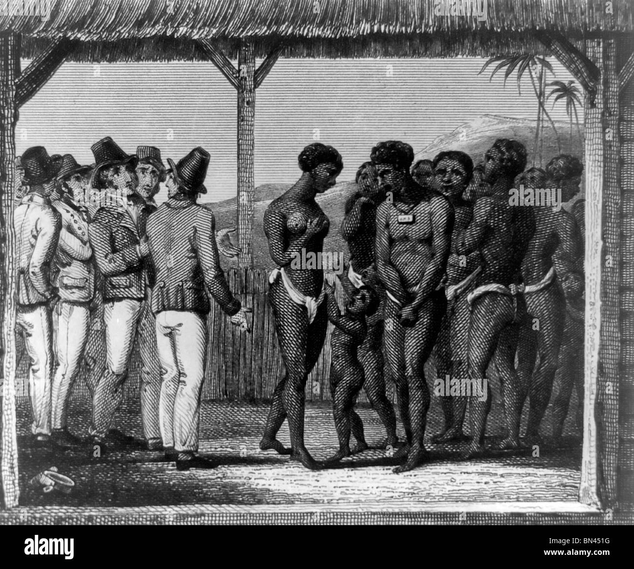 Slaves exposed for sale - Slave market Stock Photo
