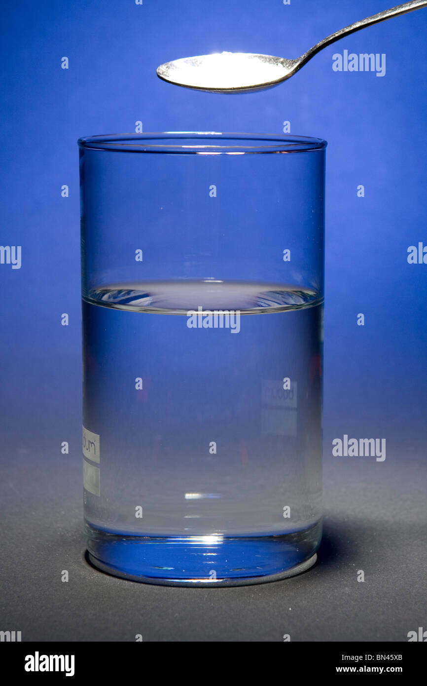 finely ground effervescent tablet dissolving in water (1 of 9 Stock