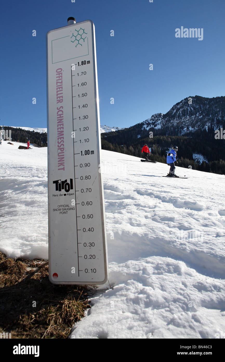 Sign showing the snow level of 0 cm in February, Jerzens, Austria Stock Photo