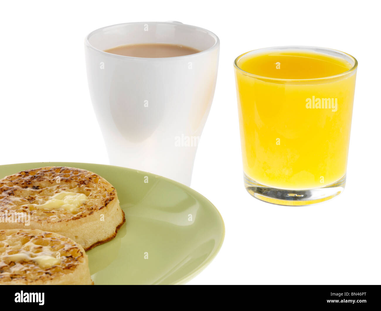Buttered Crumpets With Tea And Orange Stock Photo Alamy Buttered Crumpets With Tea And Orange Stock Photo Alamy