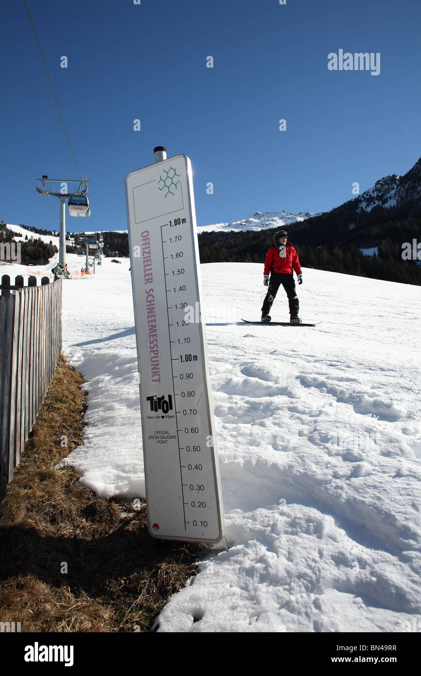 Sign showing the snow level of 0 cm in February, Jerzens, Austria Stock Photo