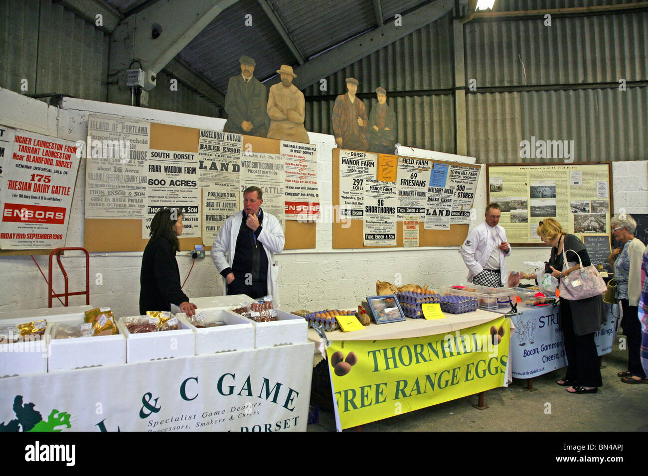 Fresh farm produce for sale on stalls in the Market Hall where farm