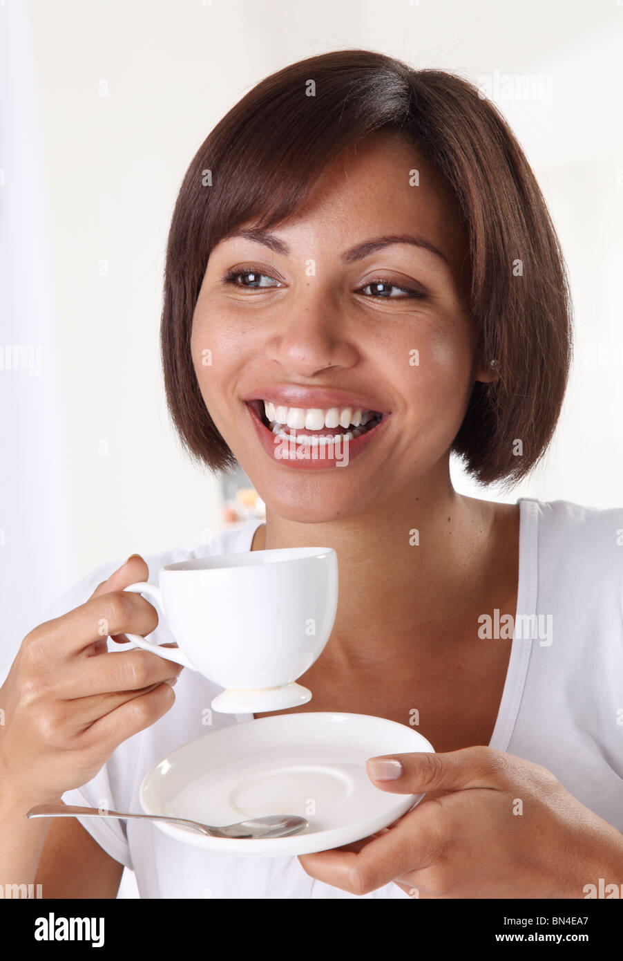 WOMAN DRINKING TEA Stock Photo