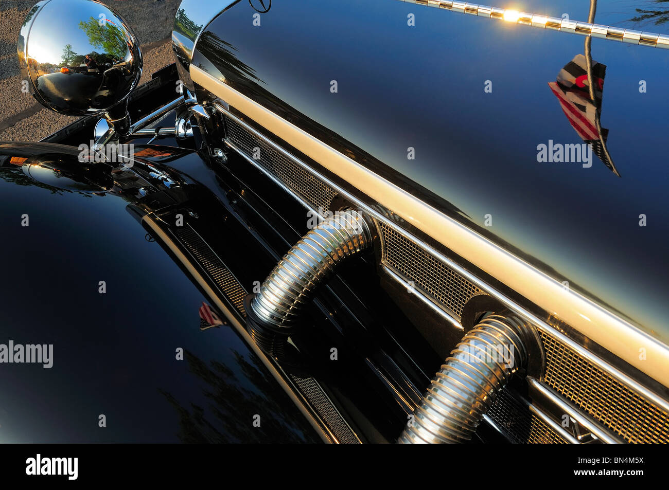 Abstract view of hood & exhaust pipes on vintage 1934 Mercedes 500K Special Roadster Stock Photo