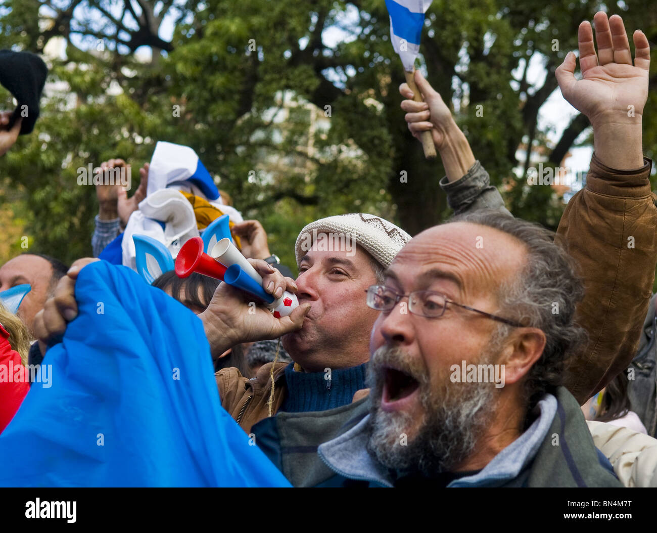 Uruguayan funs celebrating the first semifinals in 40 years after beating Ghana on 2010 world cup Stock Photo