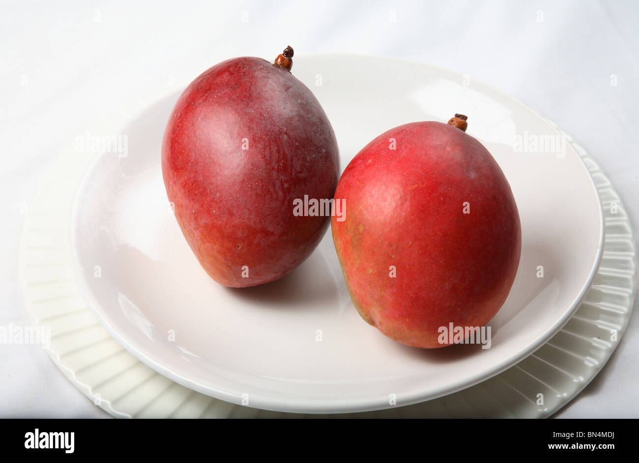 Fruit ; Red Mangos ; Sweet ; Sour test ; Colourful  ; India Stock Photo
