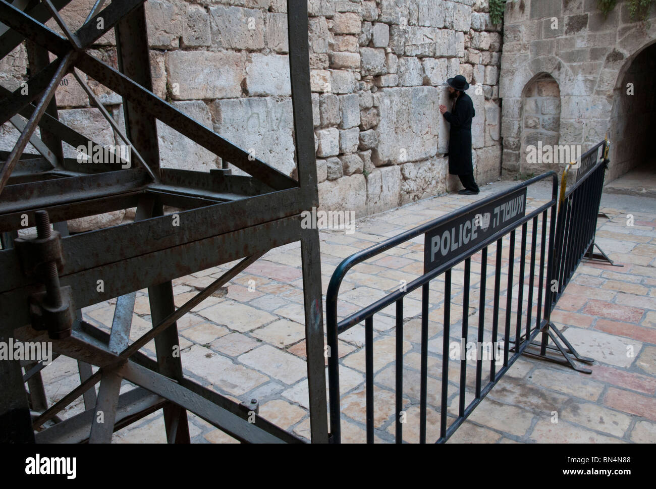 Jerusalem Old City. Orthodox Jew praying at small western wall Stock Photo