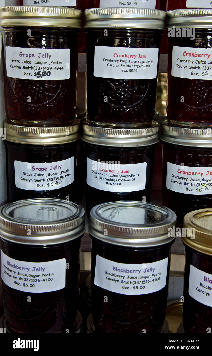 Display shelf of glass jars jams jellies at Farmers Market in Lake