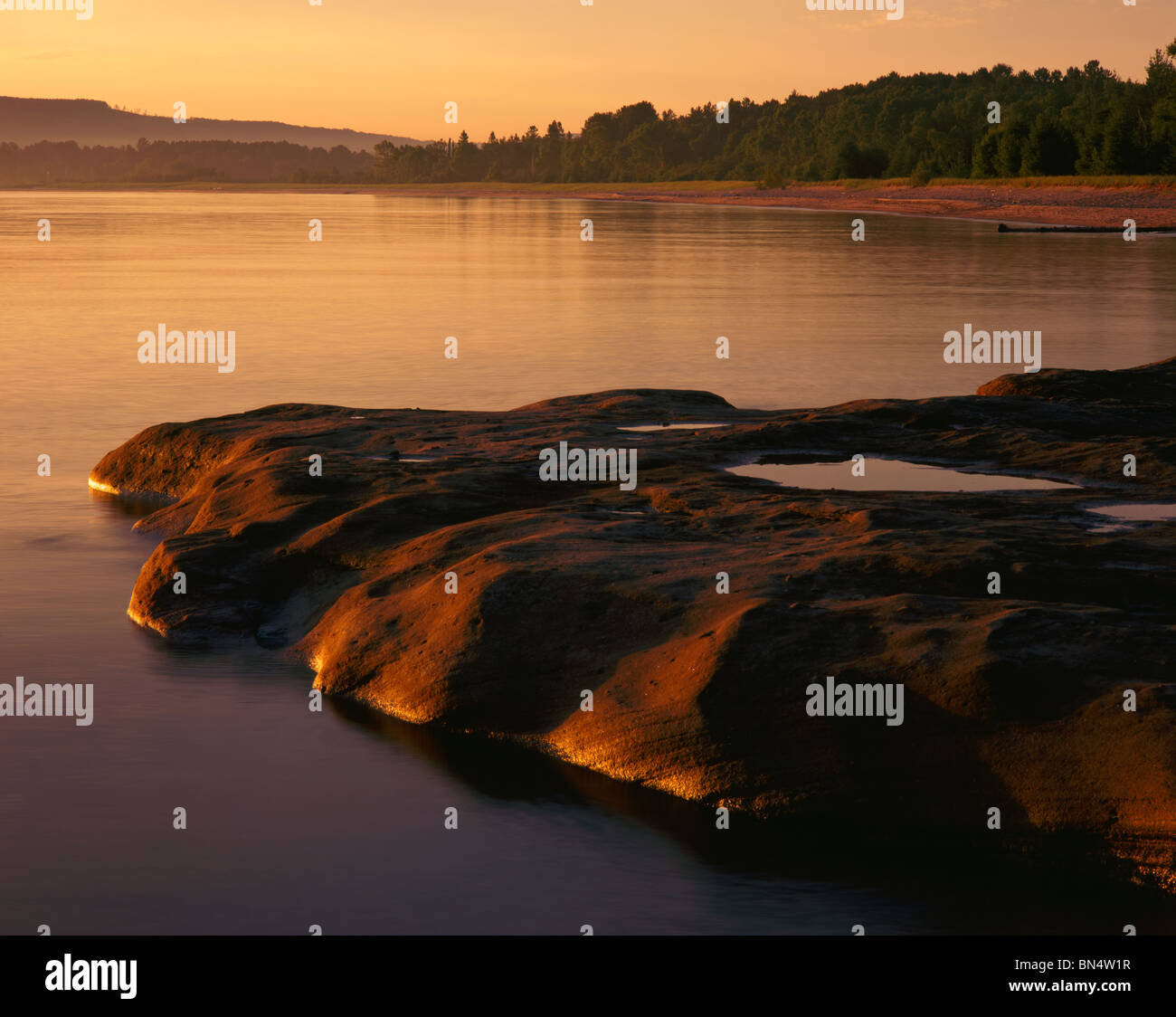 Port Wing, WI Morning light on Quarry Point and Lake Superior Stock