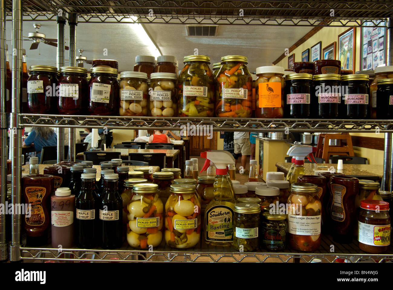 Store shelves of spices pickles condiments barbecue sauces at The