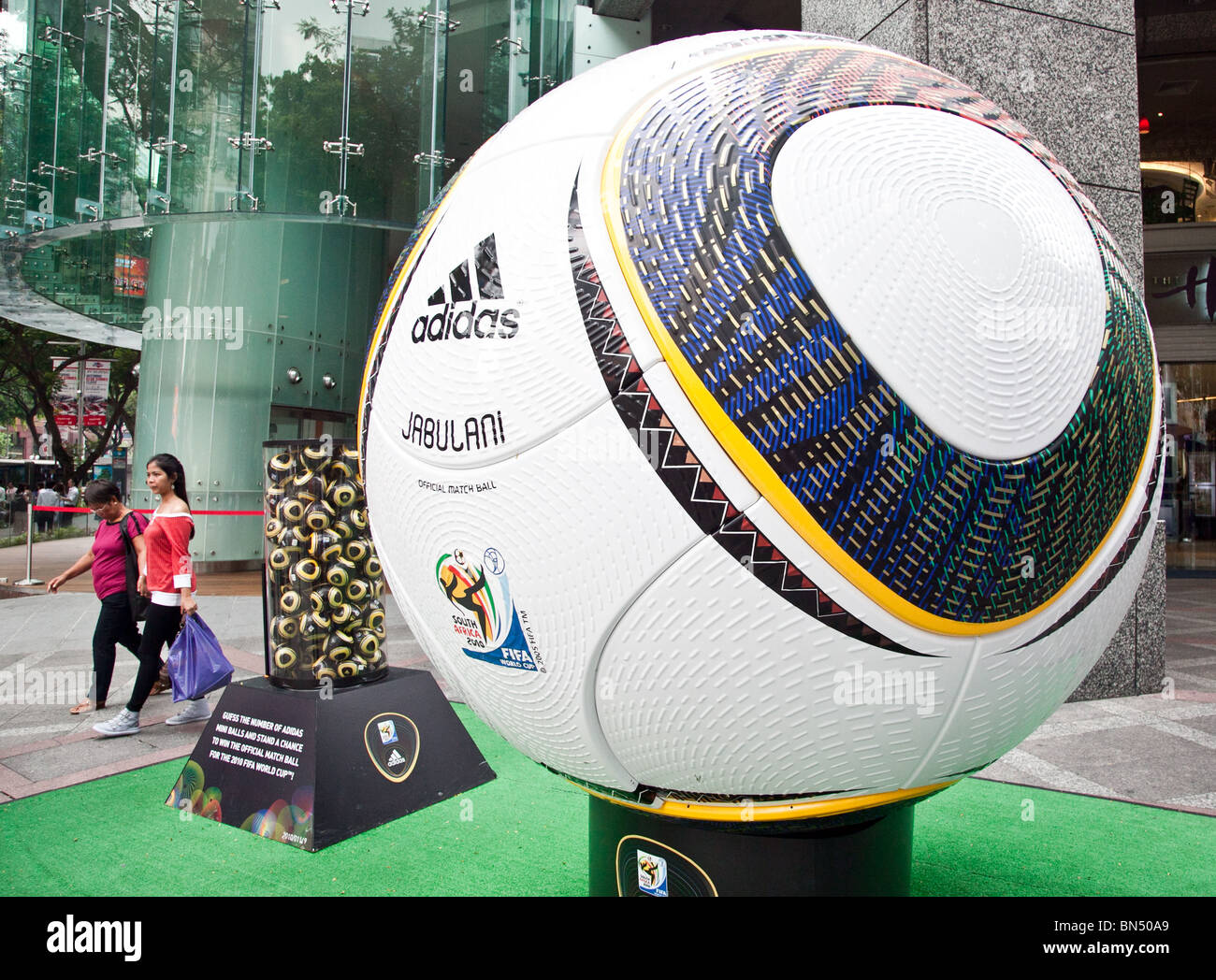 A giant 2010 World cup 'Jabulani' soccer ball on Orchard Rd in Singapore Stock Photo