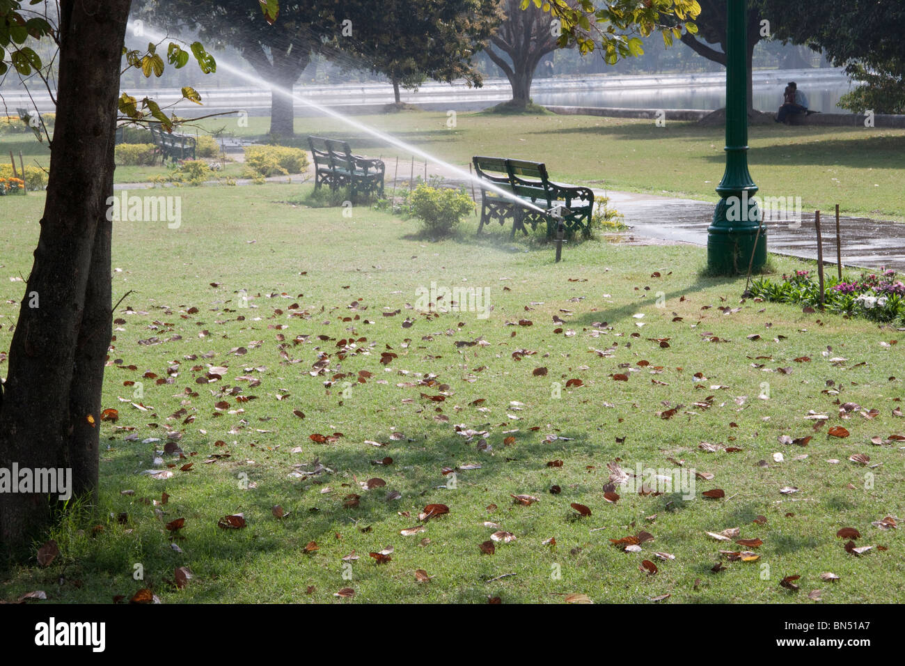 Water sprinklers at Victoria Memorial gardens in Kolkata (Calcutta), West Bengal, India. Stock Photo