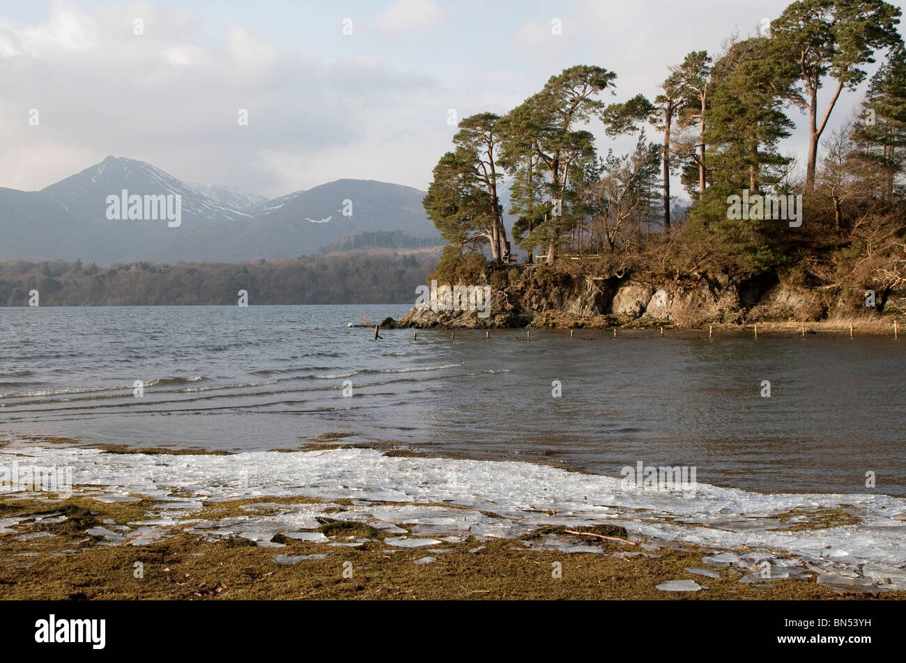 Wind driven ice on the shore line at Friars Crag Derwent Water Stock Photo