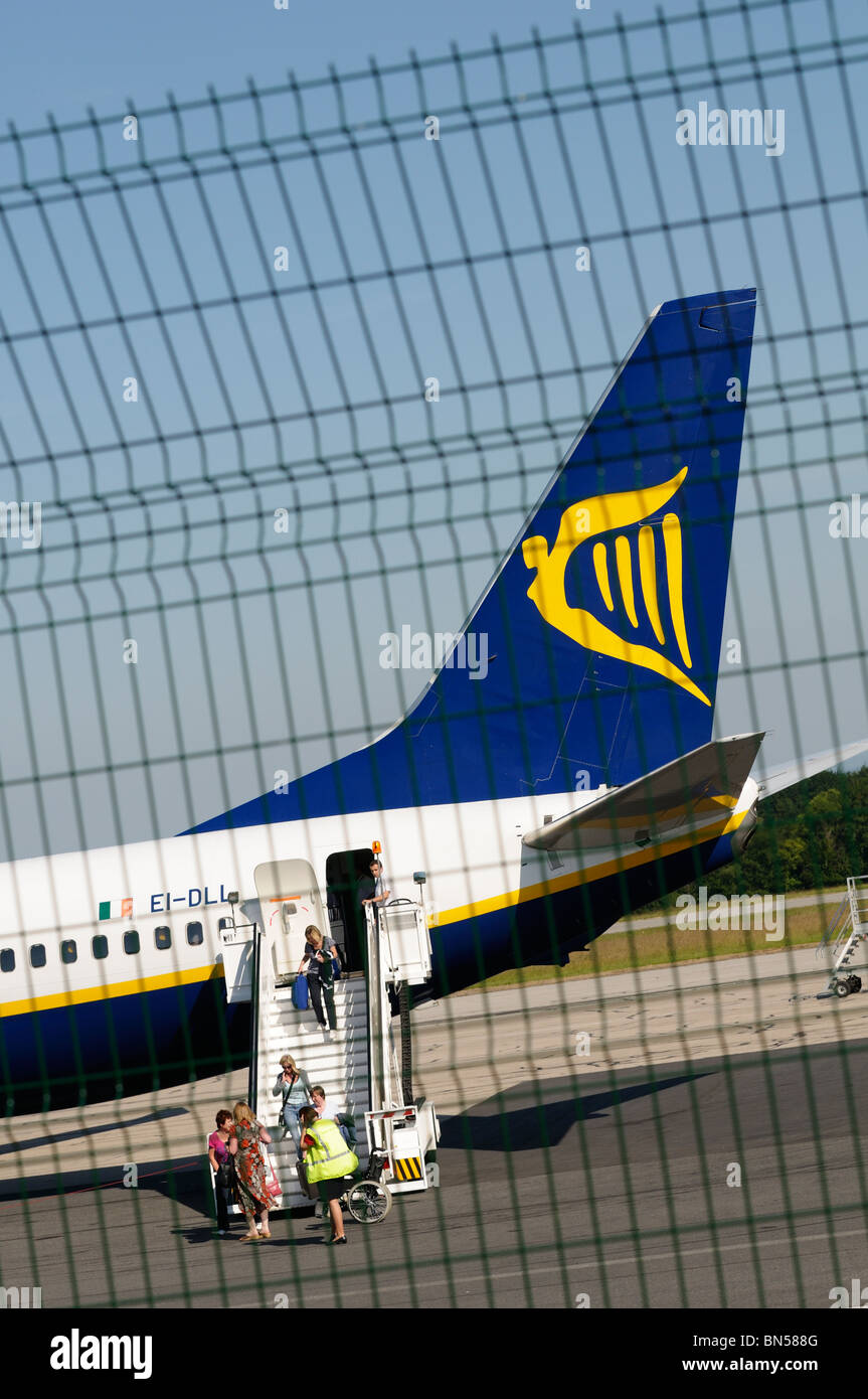 Stock photo of a tail fin of a Ryan air plane on the tarmac at Limoges airport. Stock Photo