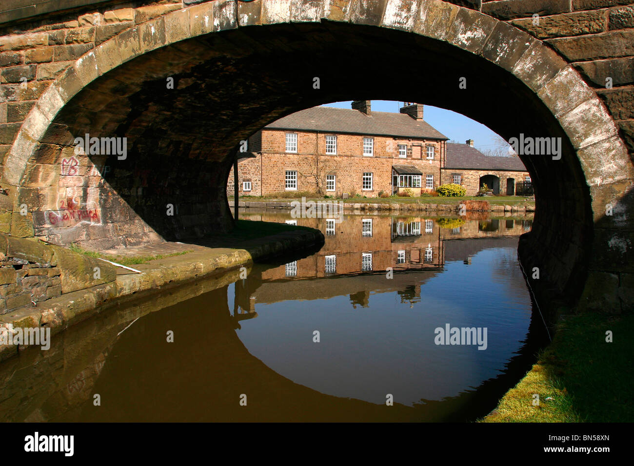 England, Cheshire, Stockport, Marple, bridge at junction of Macclesfield and Peak Forest Canals Stock Photo