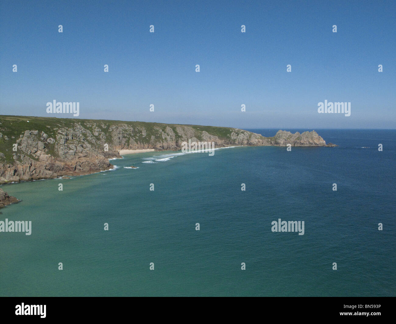 Cornwall England Porthcurno Bay beach rock cliff sea English Channel Atlantic ocean Stock Photo