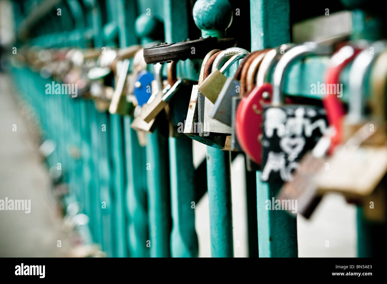 Padlock hanging on one of the bridges in Wroclaw Stock Photo
