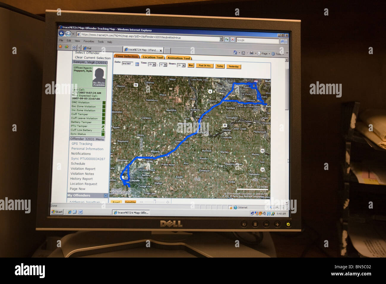 Computer screen showing software used to track movement of released inmate fitted with electronic monitoring device. Stock Photo