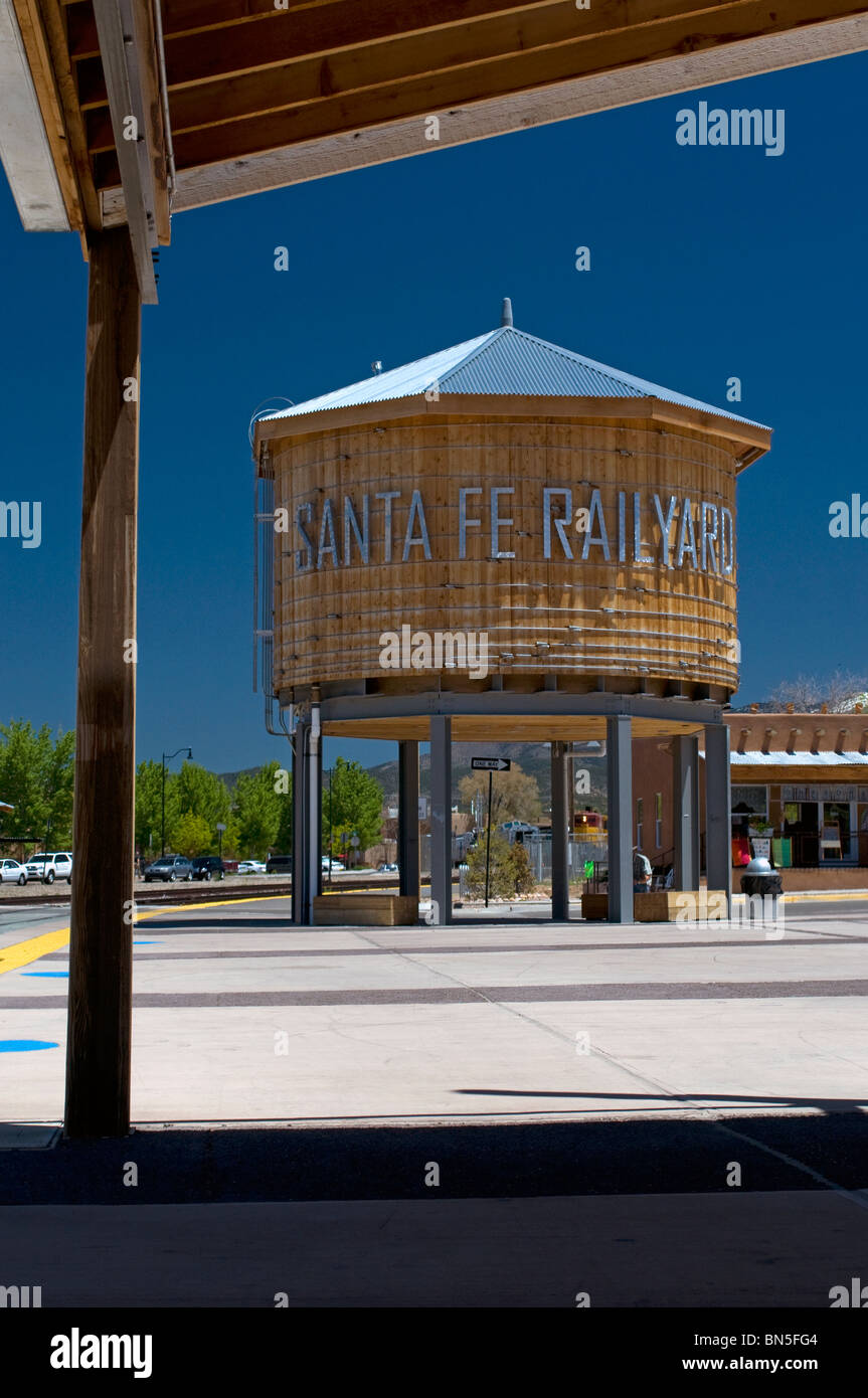 Tall Wooden water tower at Railrunner train station in Santa Fe New Mexico Stock Photo