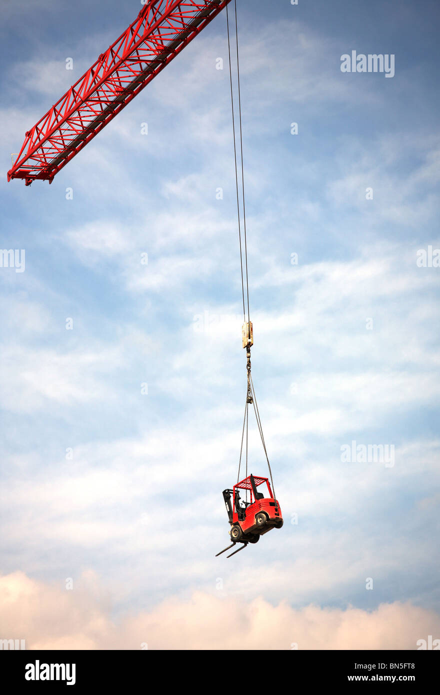 A forklift transported by a crane, Bremerhaven, Germany Stock Photo