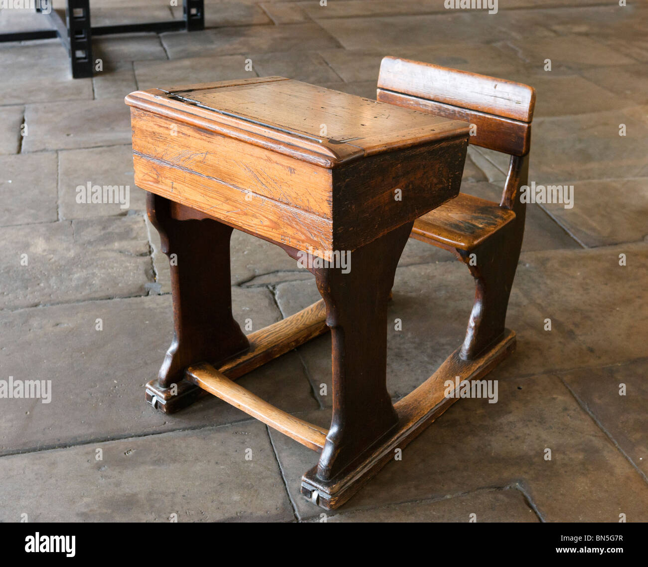 Traditional wooden school desk, Salts Mill, Saltaire, Bradford, England Stock Photo