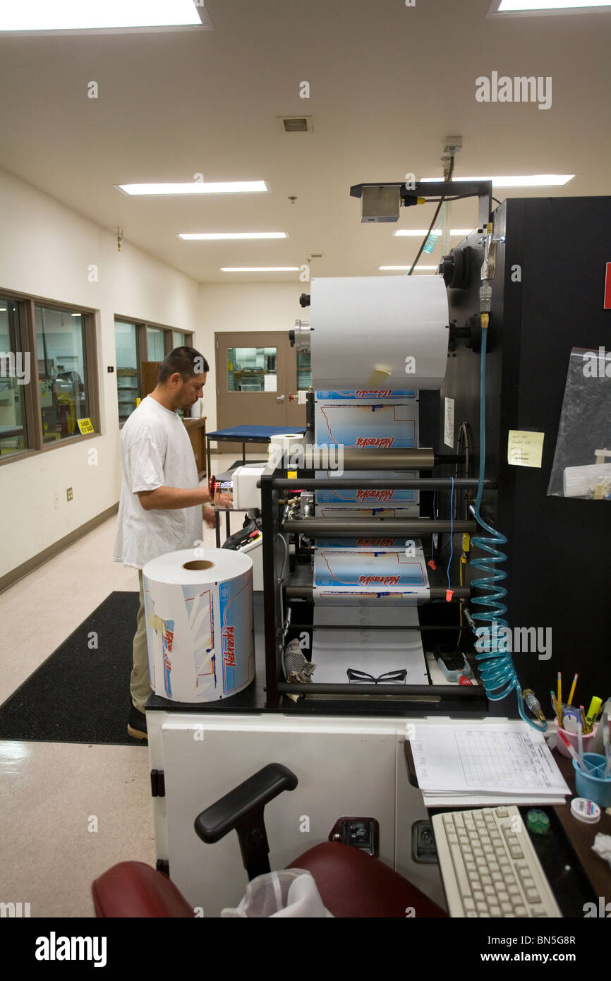 Inmate working in the license plate shop at the Nebraska State Penitentiary, a maximum security
