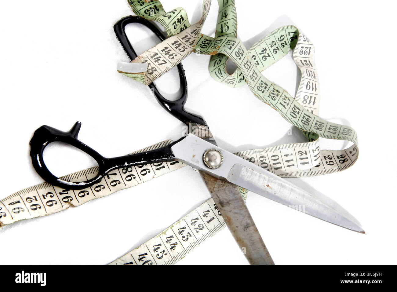 scissor and a tapemeasure Stock Photo Alamy