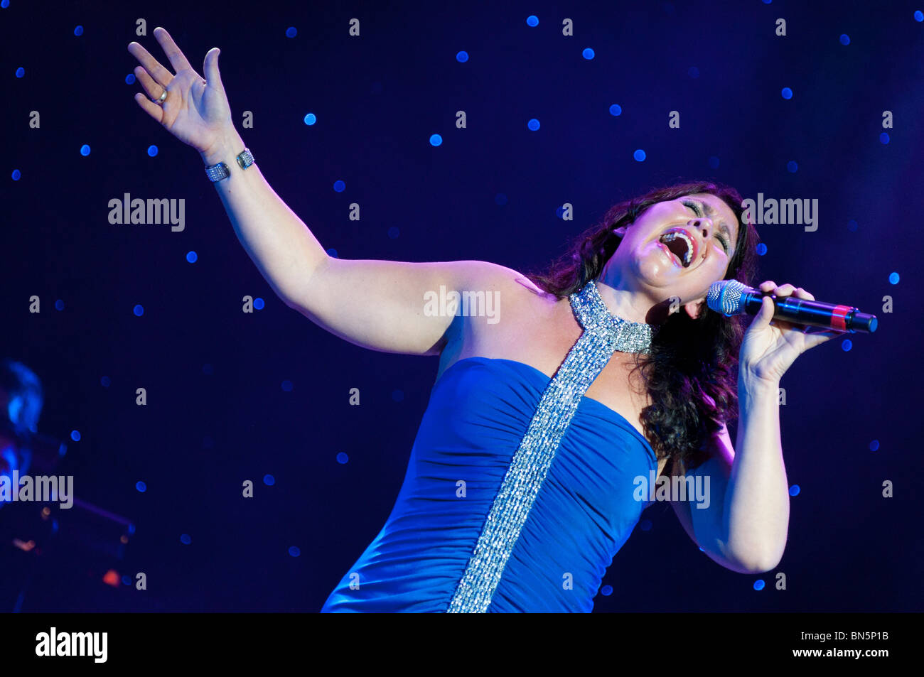 Zoe Tyler of Loose Women singing live to an audience on the Independence of the Seas cruise ship. Stock Photo