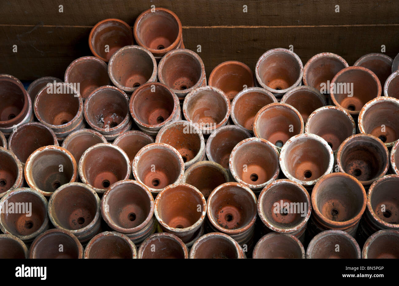 Old Victorian Clay Plant Pots Stacked In A Potting Shed Stock Photo Alamy