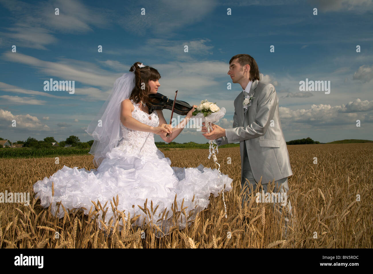 Romantic declaration of love under sounds of a violin Stock Photo