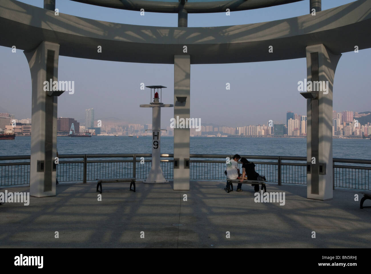 At the end of public Pier 9 with view on HK harbour. Stock Photo
