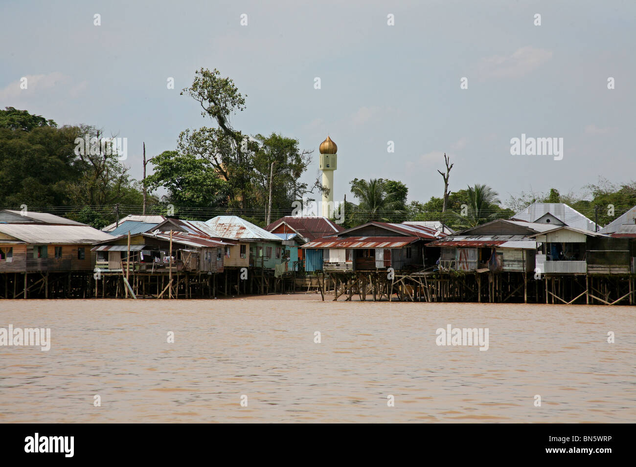 City of Sibu, Sarawak, Borneo, Malaysia, malay village with Sibu mosque from the rajang river Stock Photo