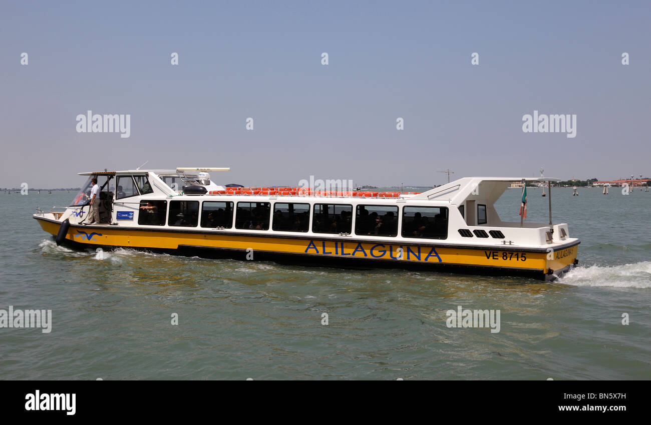 A Alilaguna waterbus which links the airport to the city and it's lagoon islands Venice Italy Stock Photo