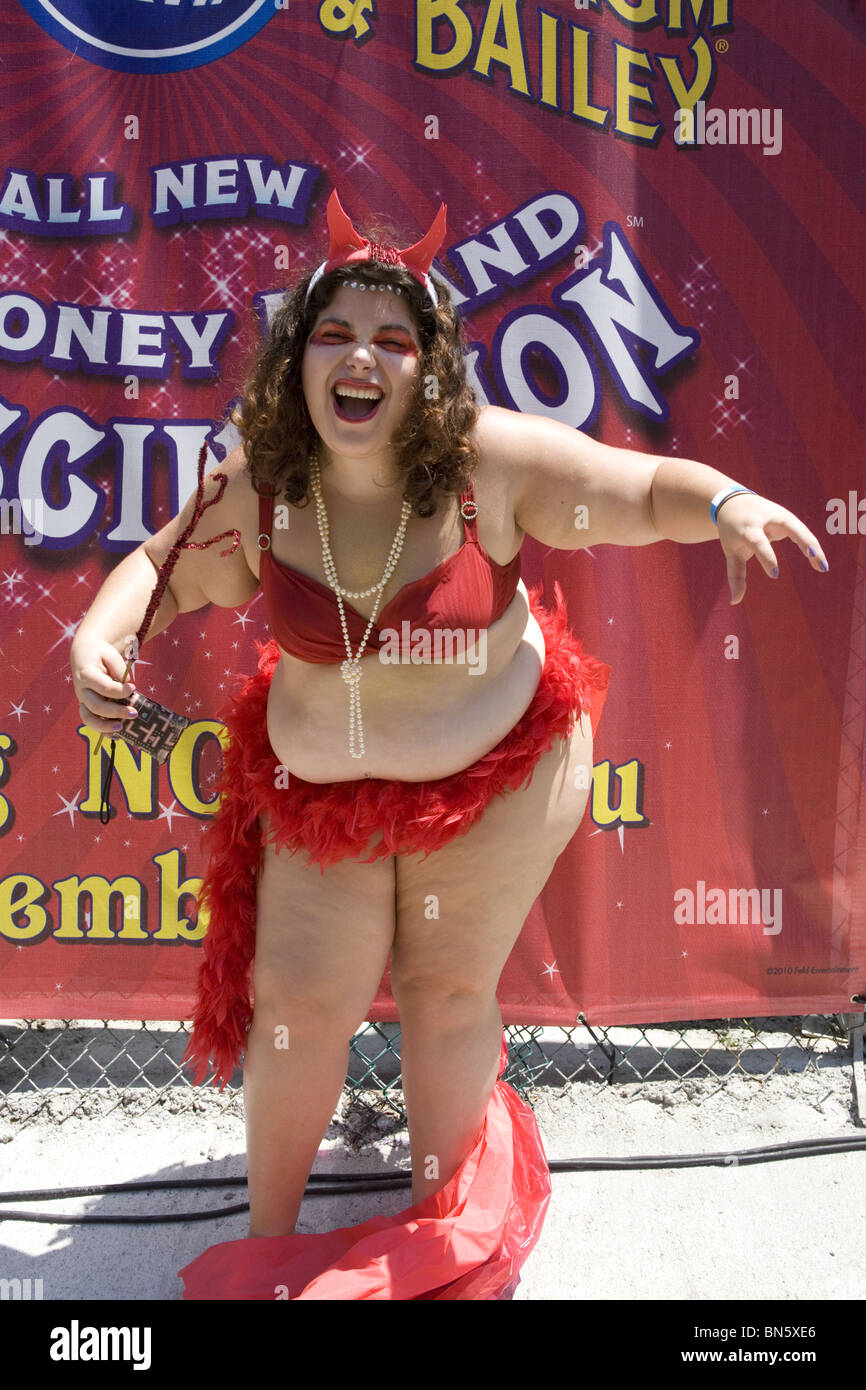 2010: People of all shapes and sizes help to officially open summer at Coney Island by marching in the annual Mermaid Parade. Stock Photo