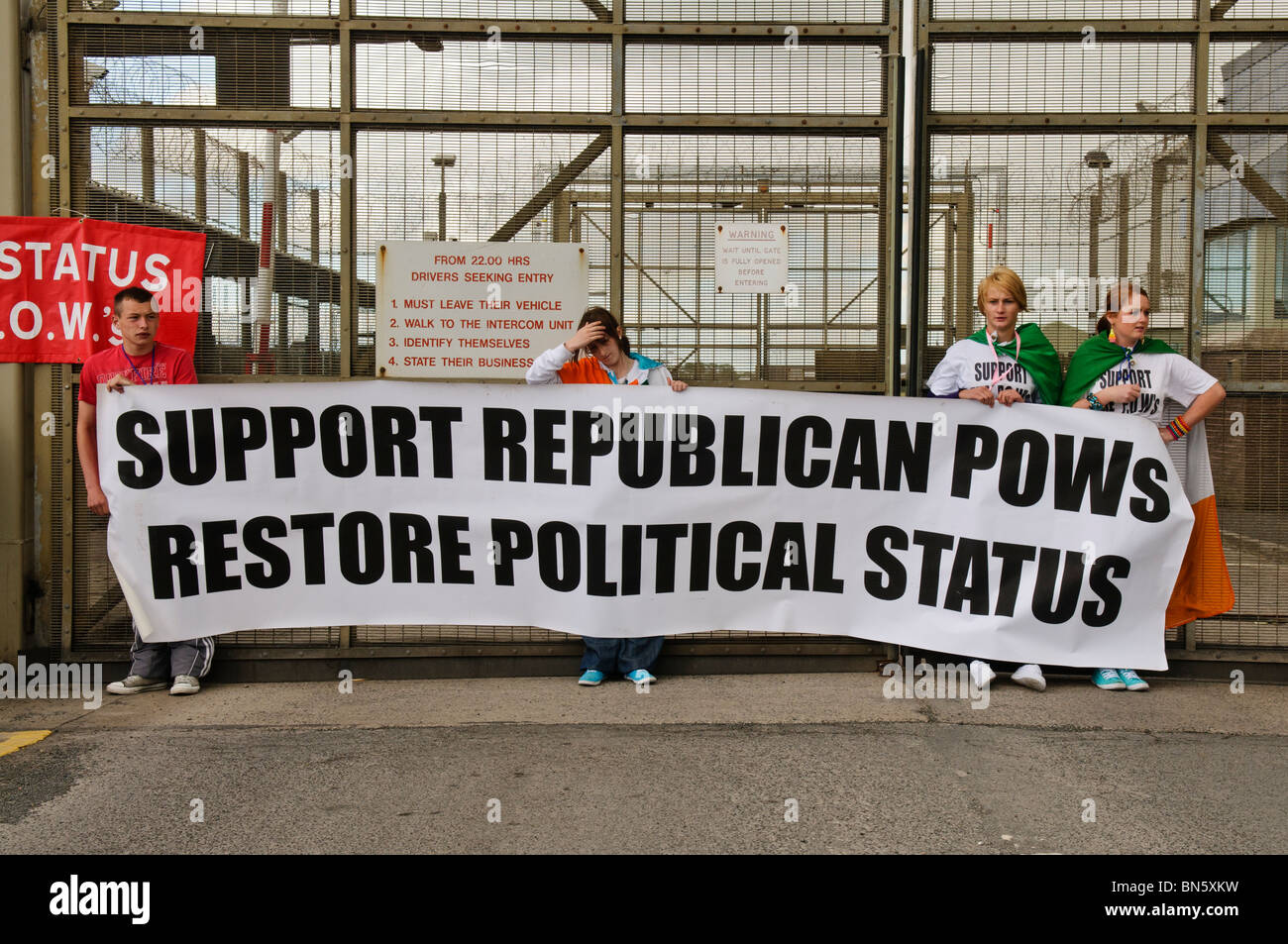 Demonstrators carry a banner saying 'Stop psychological torture of republican POWs' Stock Photo