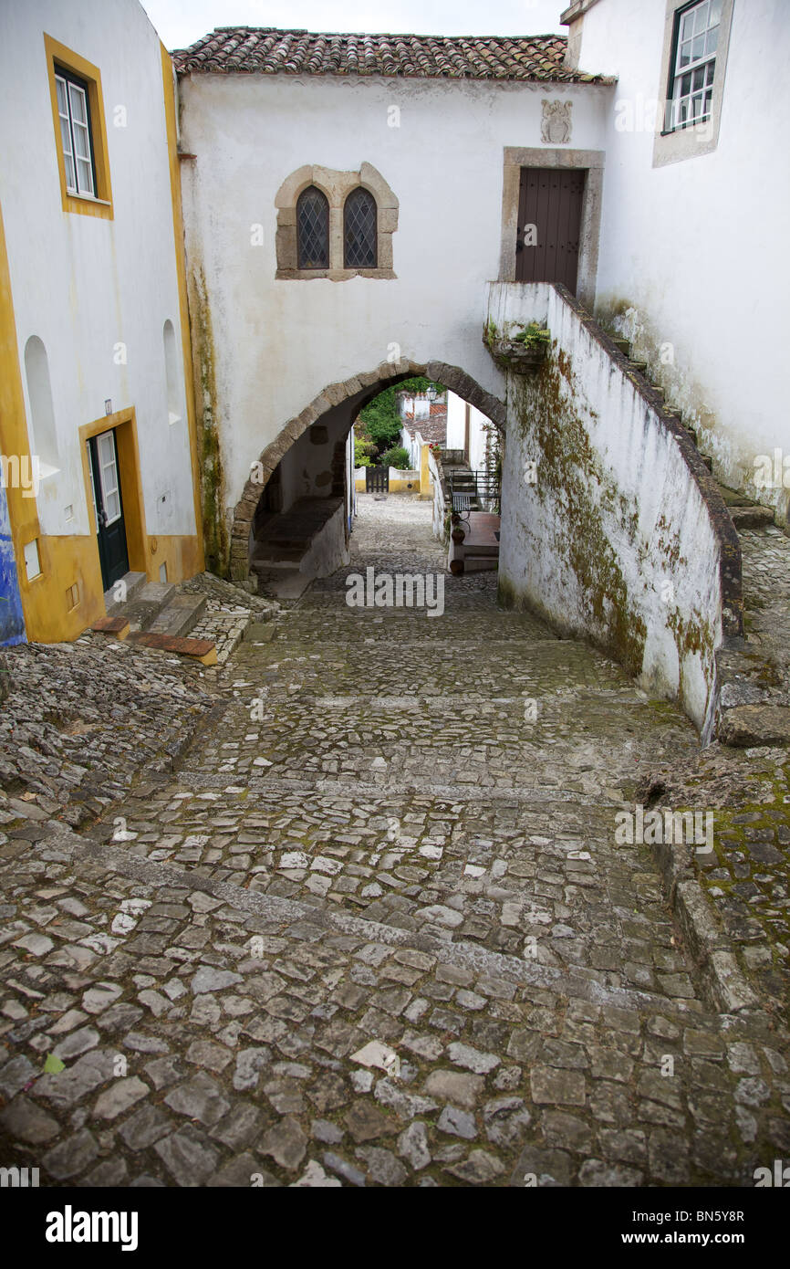 Medieval Homes against on a Rustic Cobblestone Street of Old World Europe Stock Photo