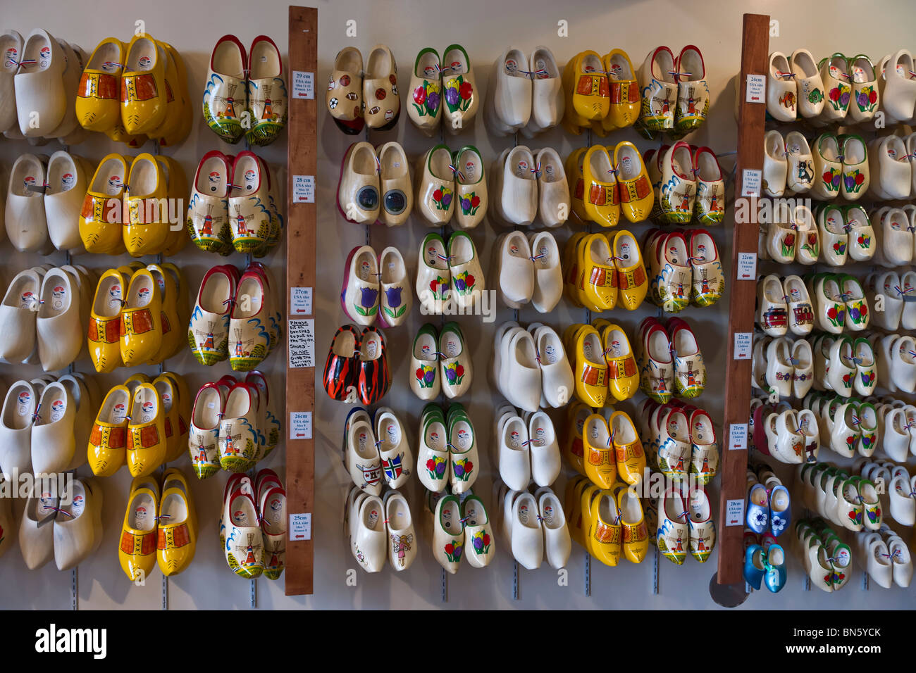 Tulip time festival Dutch Holland Michigan in USA  Dutch clogs clog klomp klompen in the full wall room in shop front view during a trade fair hi-res Stock Photo