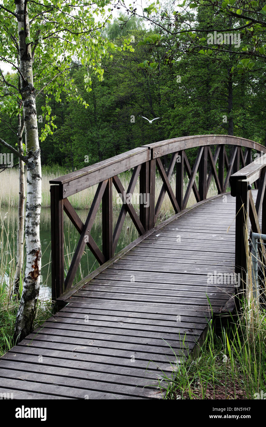 A wooden bridge at Lilla Holmen at Slemmern Eastern Harbour in Mariehamn on the Aland island archipelago Finland Stock Photo