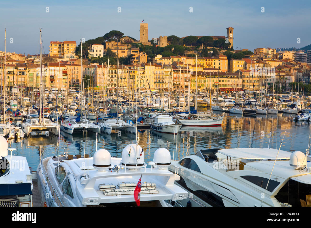 Sunrise over Vieux Port (Old Harbour) and old quarter of Le Suquet, Cannes, Cote d'Azur, France Stock Photo