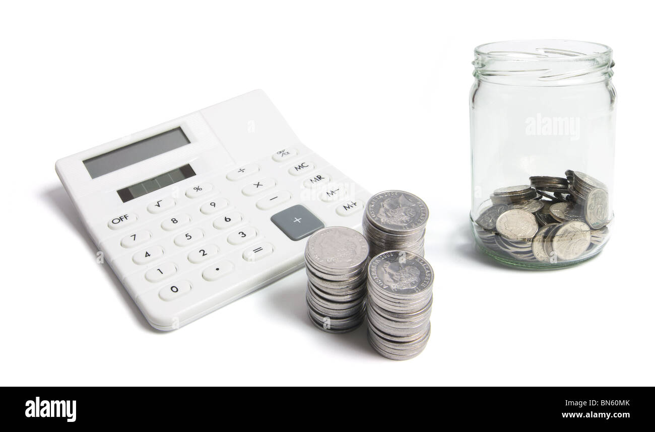 Calculator and Coins Stock Photo - Alamy