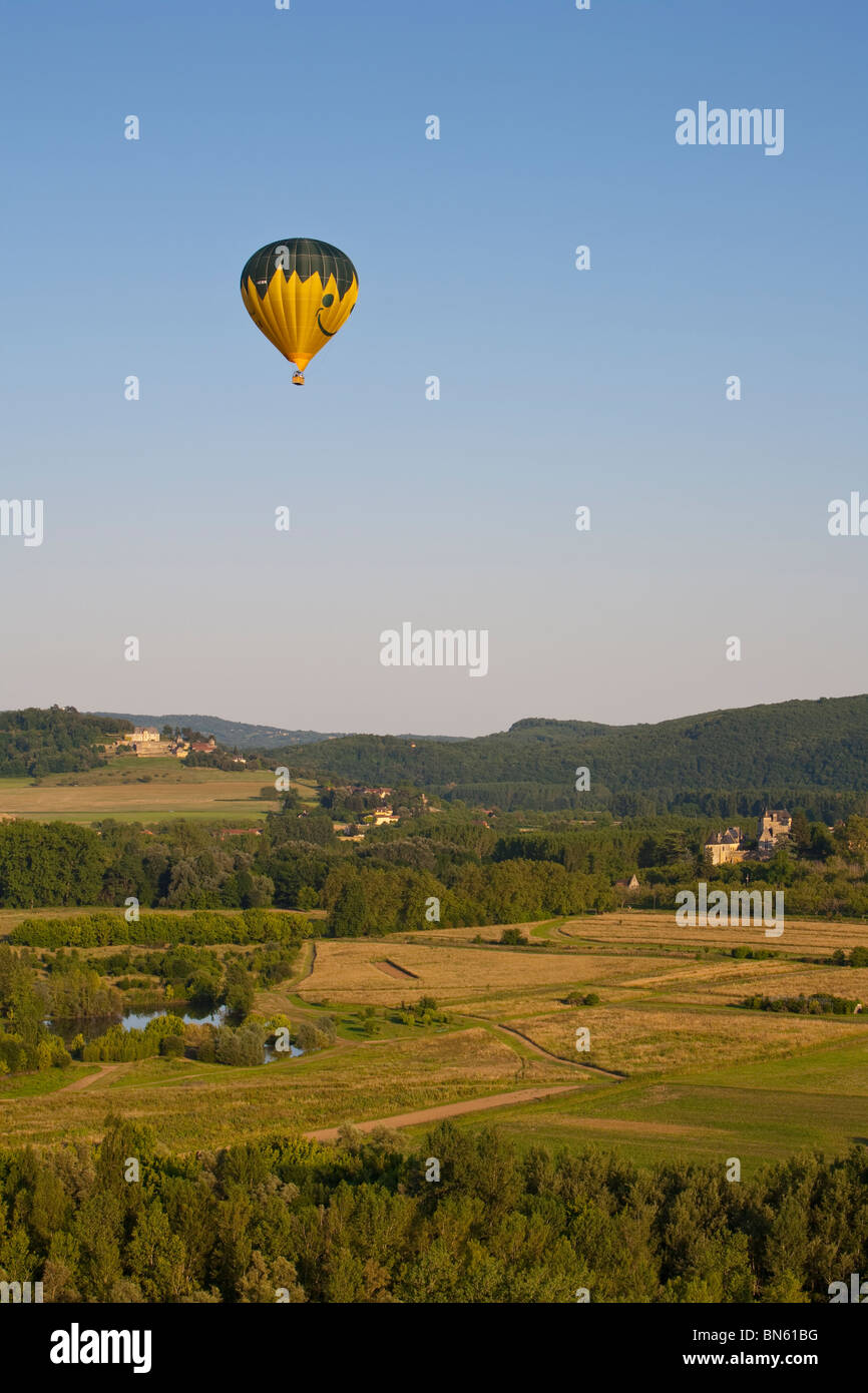 Hot air ballooning over Chateau de Marqueyssac & Chateau Les Milandes, Dordogne, France Stock Photo