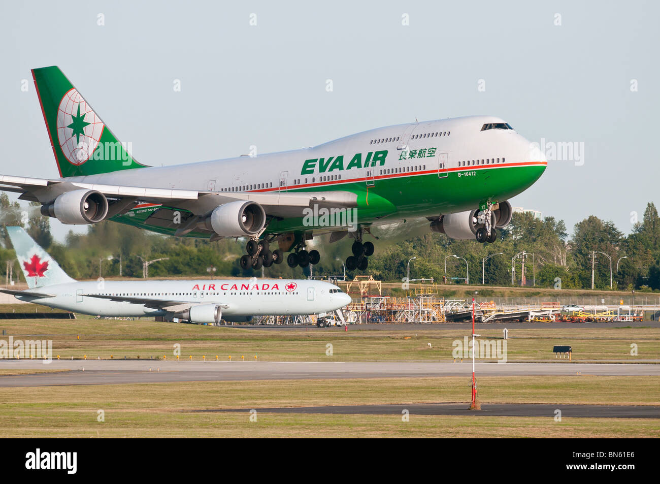 An EVA Air Boeing 747 (747-400) jet airliner landing at Vancouver International Airport. Stock Photo