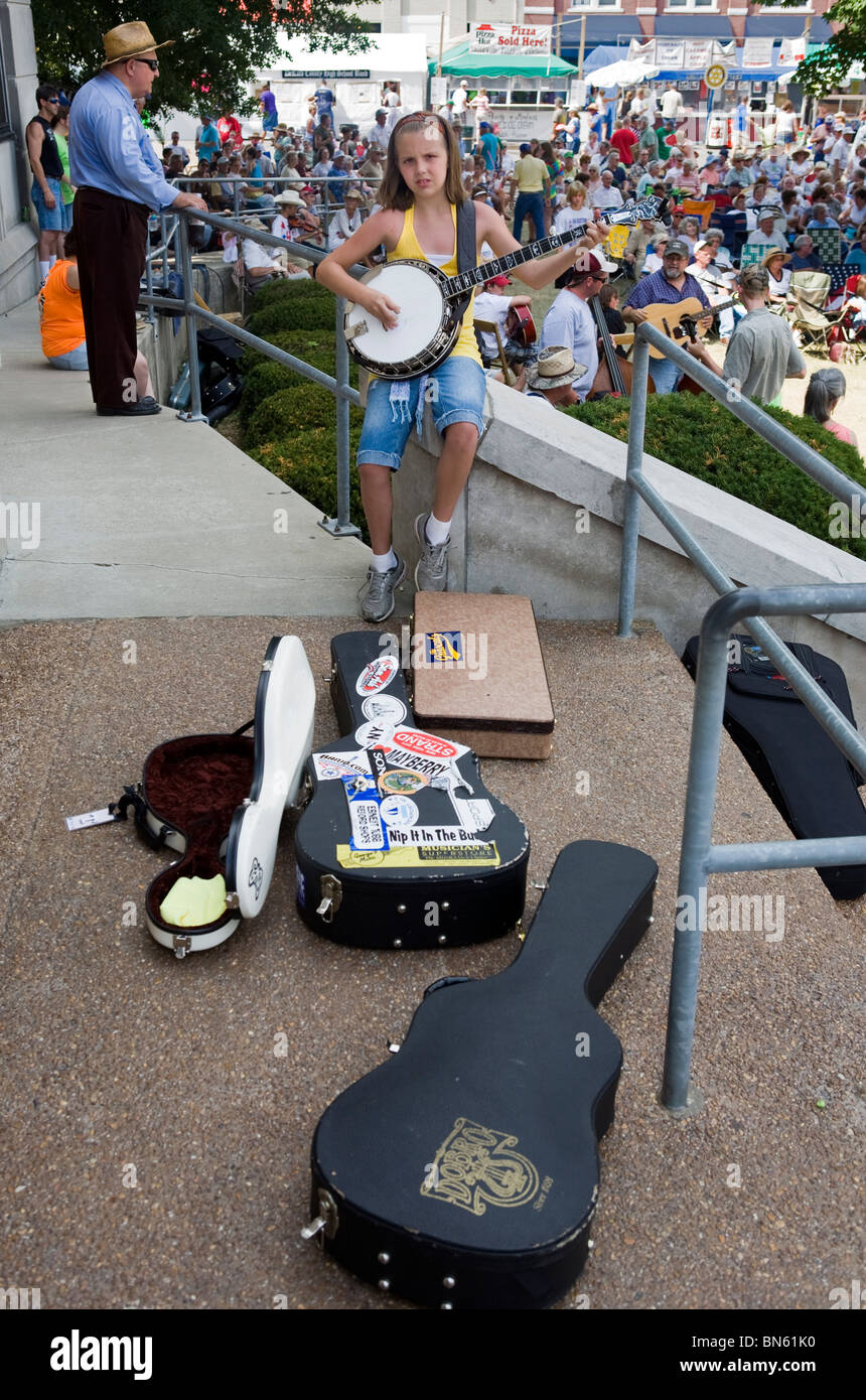 Young banjo player practicing before performing at the Smithville