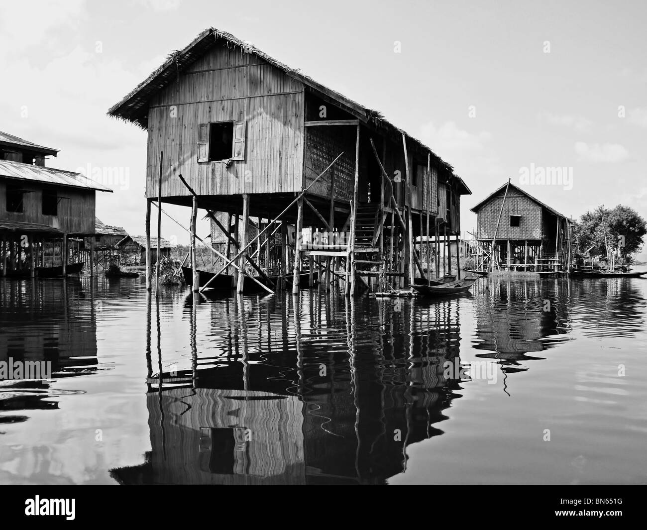 Stilted houses on Inle lake in Myanmar - in b/w color Stock Photo
